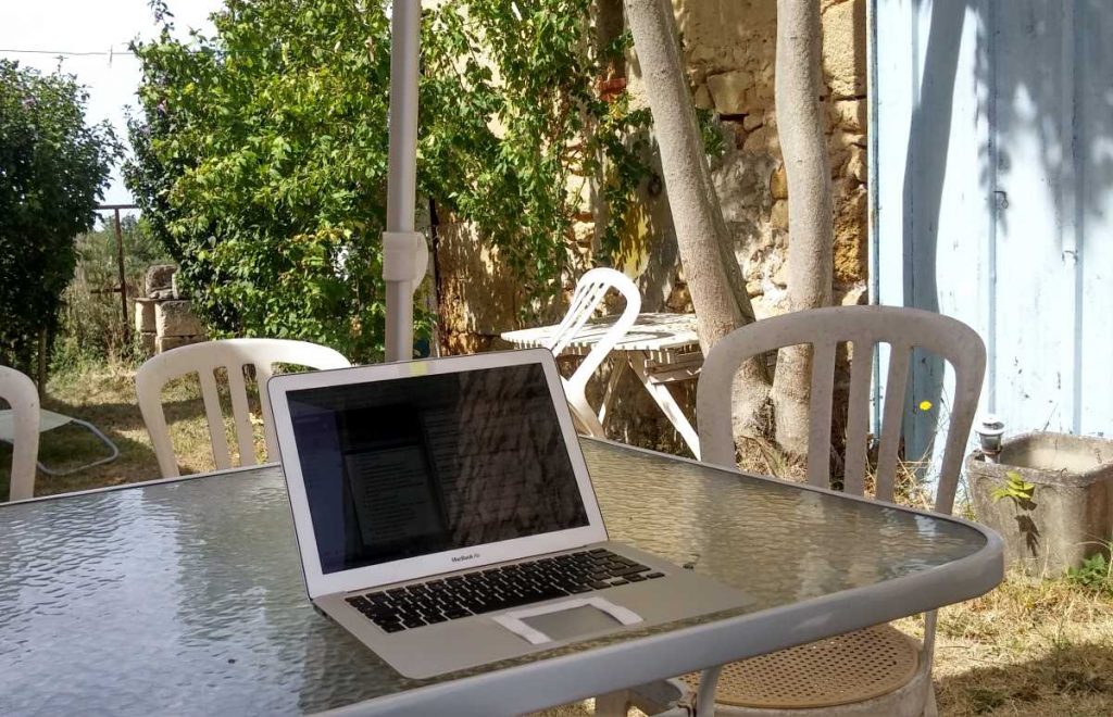 digital nomad laptop outdoors in garden in France