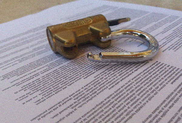 open lock on a document paper sheet