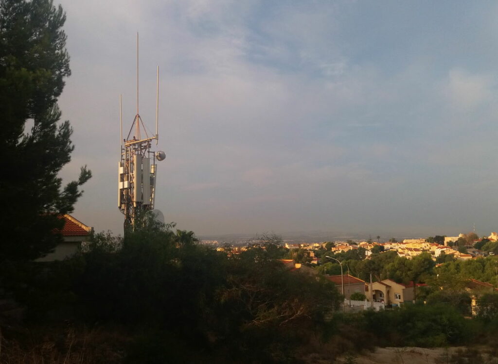 mobile network cellular tower at sunrise